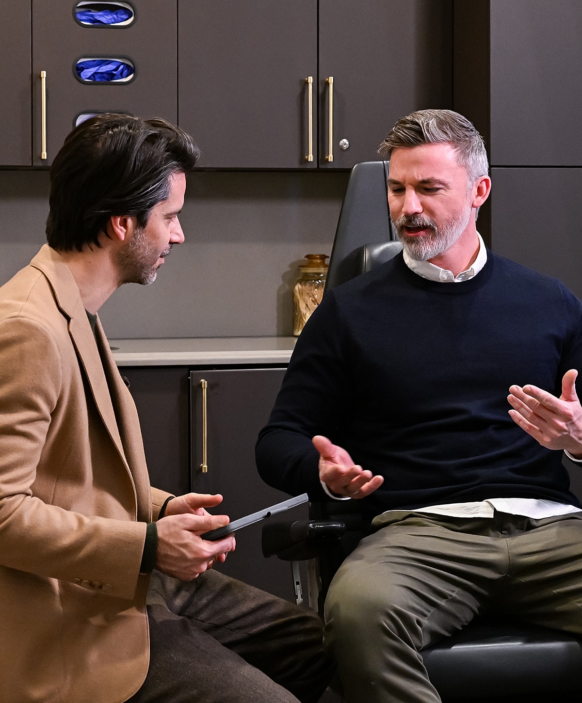 Two men engaged in a conversation.