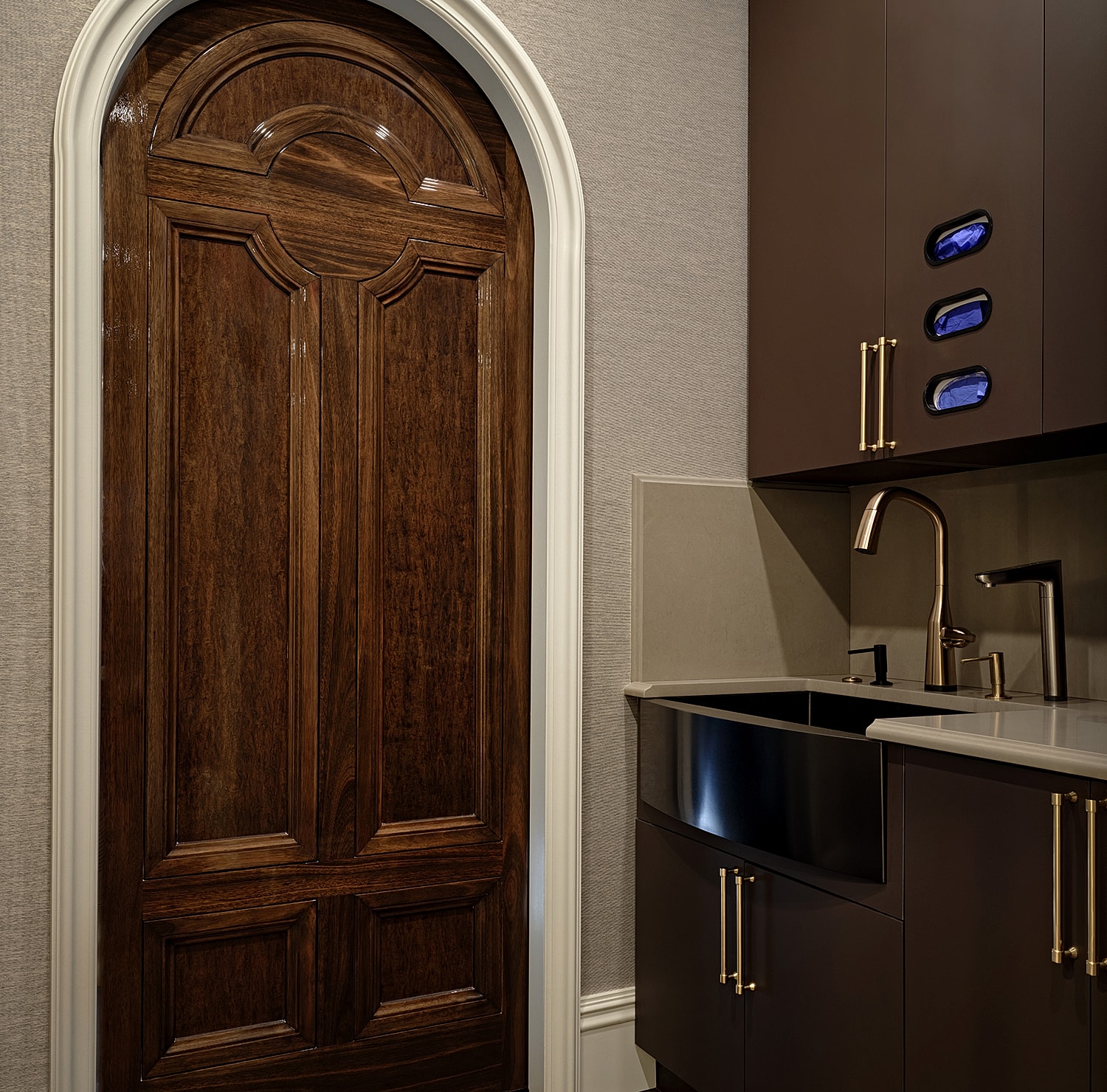 Elegant dark wood door near modern sink.