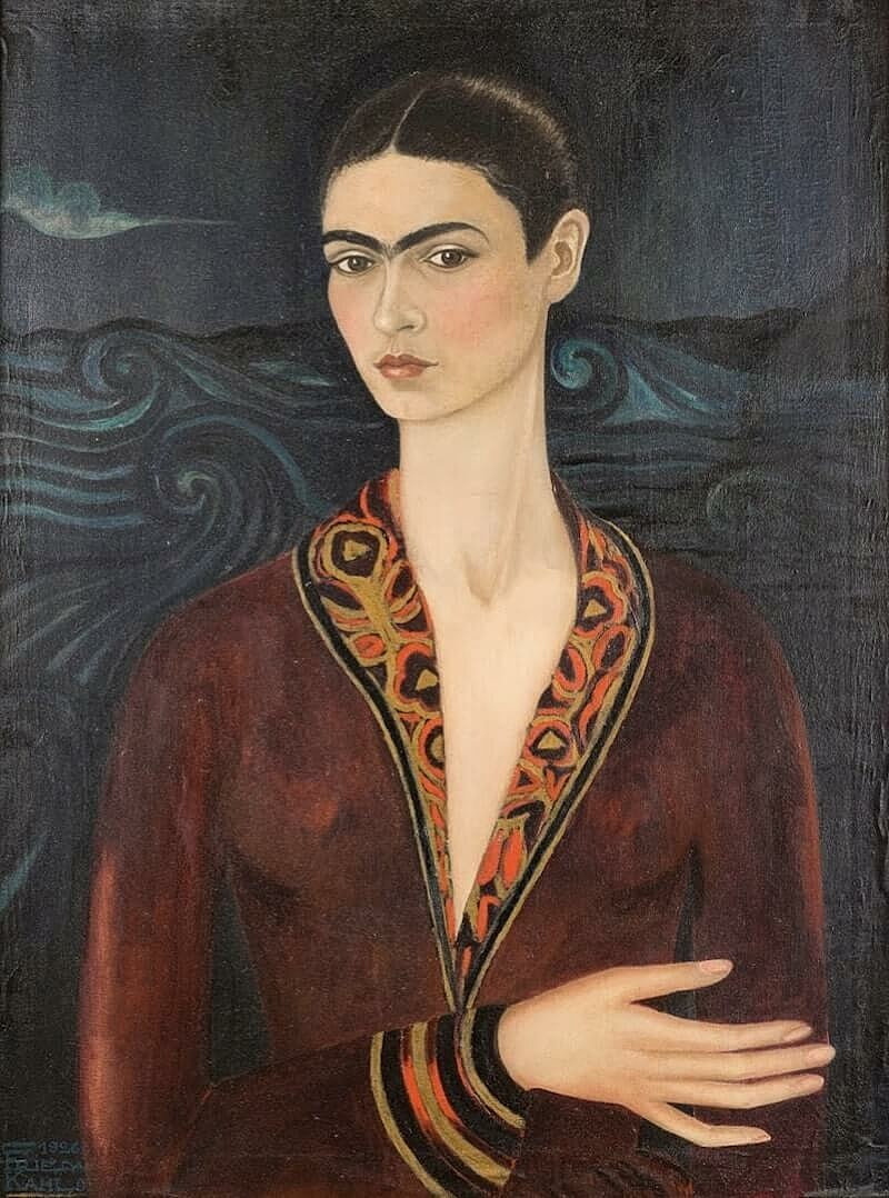 Portrait of a woman with bold features and attire.