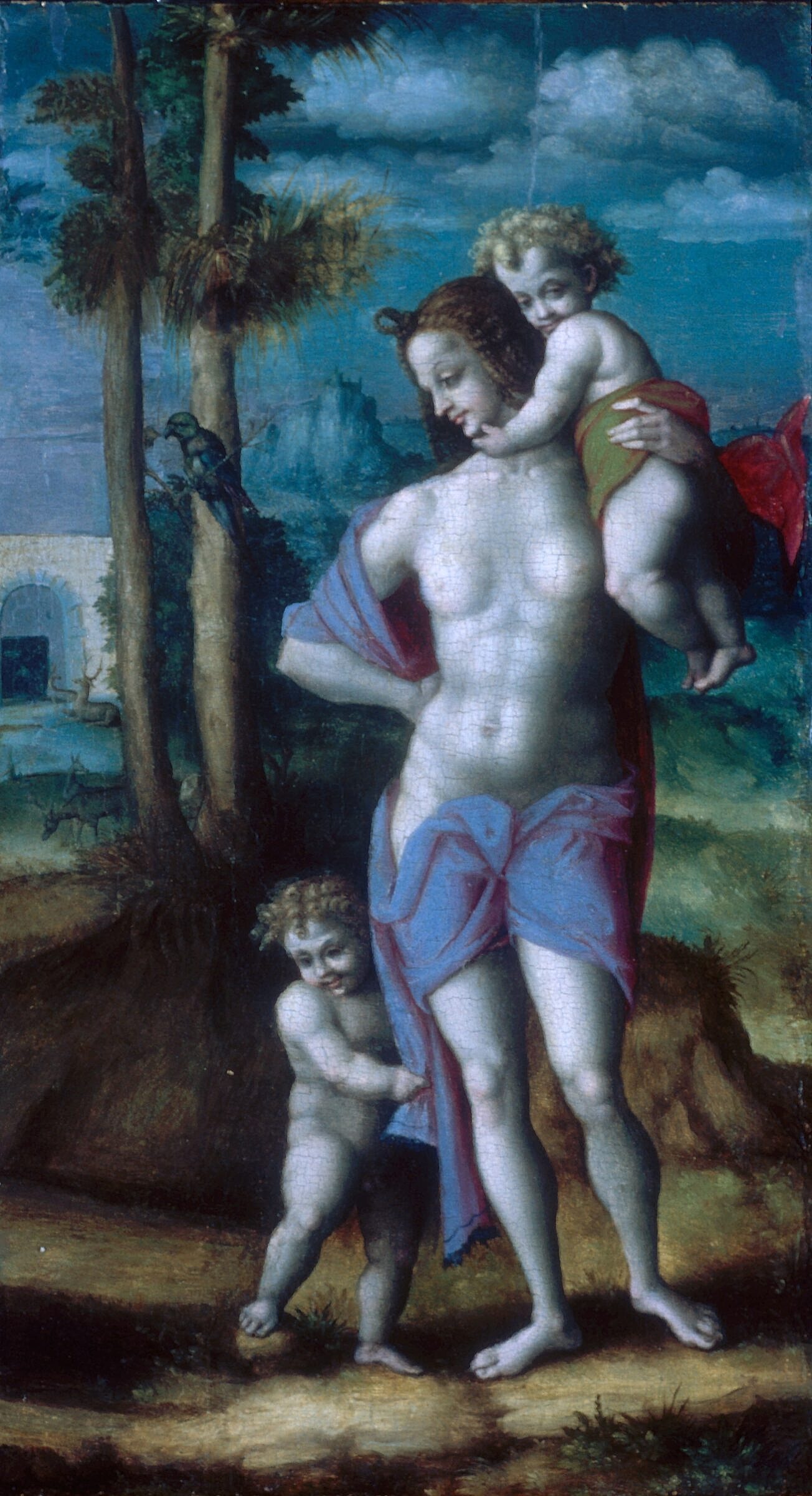 Woman with children in a lush landscape.