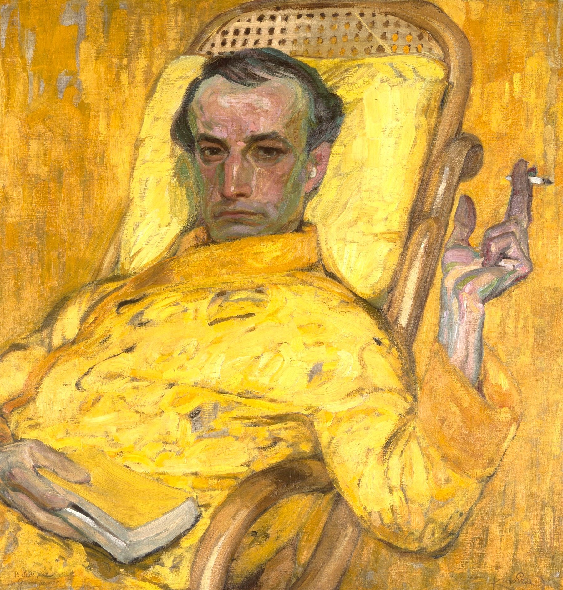Portrait of a man in yellow attire lounging.